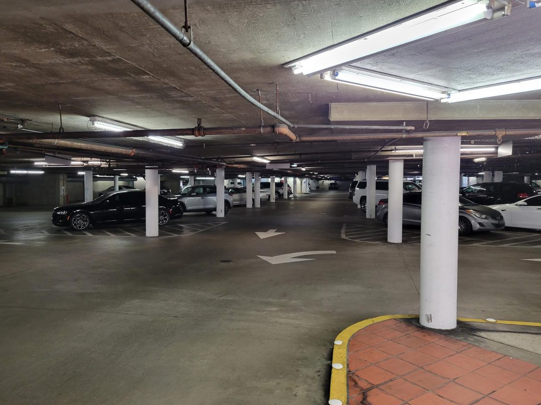 Covered parking garage beneath the gym with 300+ spaces