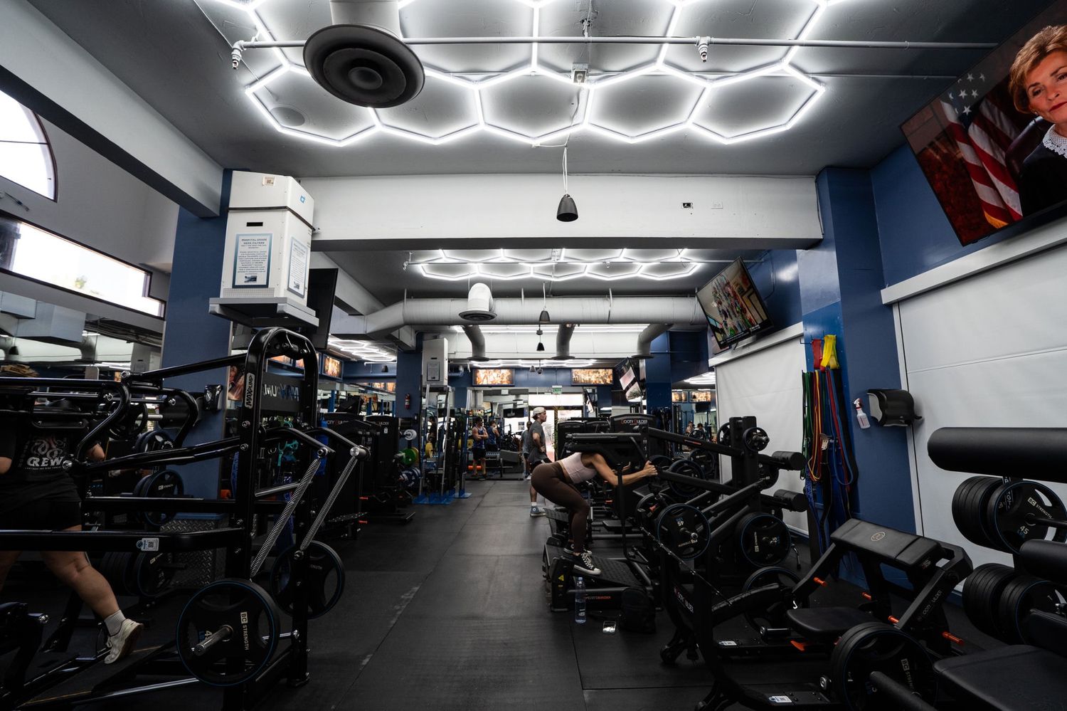 Cardio and machines under hex lighting